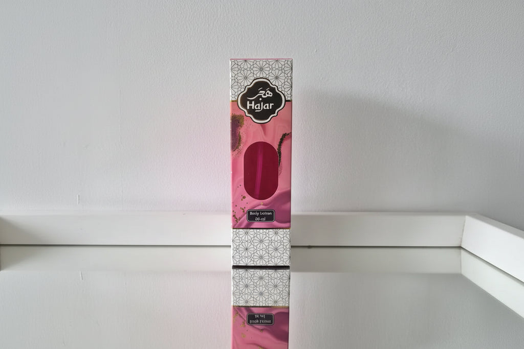 Hajar product packaging with pink and white design on a white background