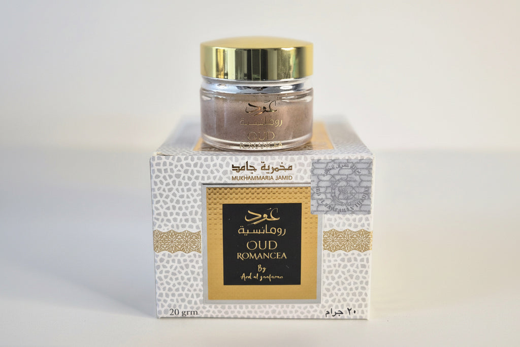 Perfume bottle and packaging on a white background