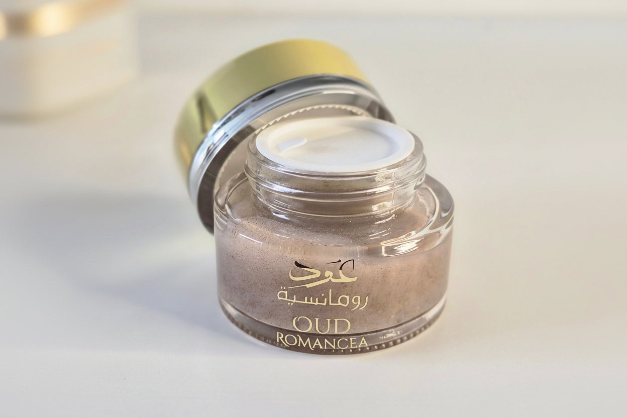 Small glass jar with a metal lid on a light gray background